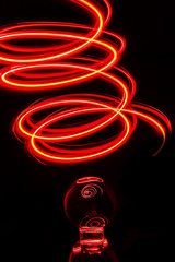 red an orange swirl of light trails
