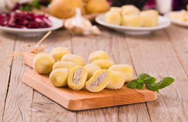 Potato gnocchi stuffed with radicchio and ricotta.	