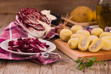 Potato gnocchi stuffed with radicchio and ricotta.	