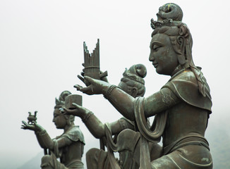 ancient statues in the garden of the big buddha. sculptures of goddesses. ancient sculptures