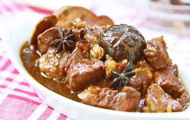 Mushroom braised pork or Steamed Pork with spice and black soy sauce (Thai name is Moo Tun).