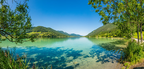 Panoramic view over lake Weissensee in Austria in summer during daytime