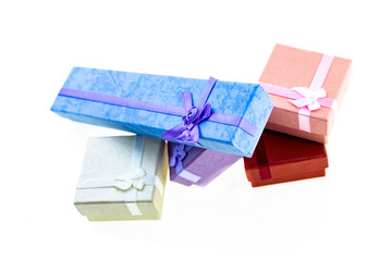 set gift boxes of holiday surprise blue red gray closeup on an isolated background