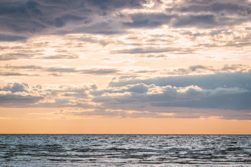 Fototapeta premium Marine backgroundwith beautiful sunsetand dusk scene over the sea.