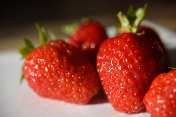Fresh isolated strawberry on the table