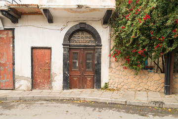 Fototapeta na wymiar House on street of Old Town in Larnaca, Cyprus