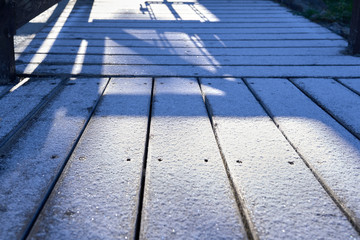 Fototapeta premium Roof tiles. Winter roof background with snow on it
