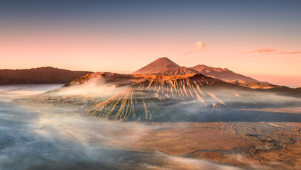Colourful sunrise at the Mount Bromo, King Kong Hill Viewpoint. Wideangle panorama shot of amazing...