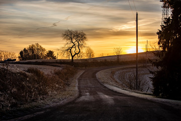 dirt road winter sunrise