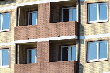 Balconies and windows of a multi-storey new house