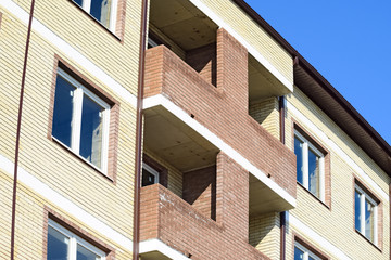 Balconies and windows of a multi-storey new house