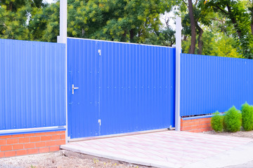 Blue gate and fence