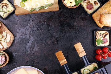 Delicious traditional Swiss melted raclette cheese on diced boiled or baked potato.