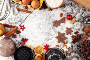 Baking christmas cookies. Typical cinnamon stars bakery with spices. xmas decoration on table