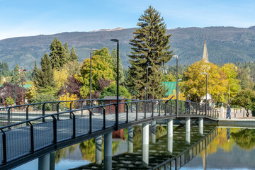 Bridge, lake, and autumn trees in Northern Patagonia