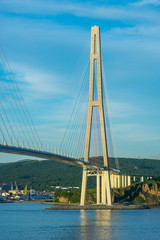 Fototapeta na wymiar Details of the Russian bridge against the blue sky.