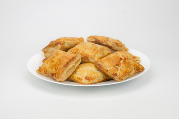 Guava puff pastry on a plate isolated in white background