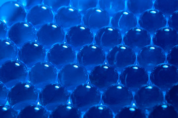 Texture of blue gel balls with blur