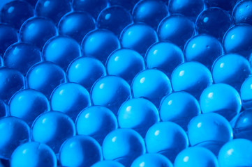 Texture of blue gel balls with blur