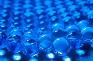 Texture of blue gel balls with blur