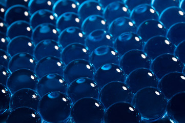 Texture of blue gel balls with blur