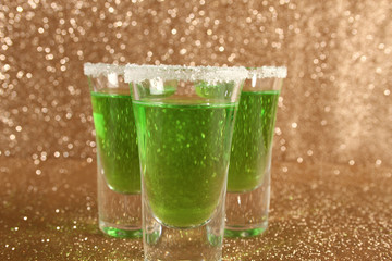 Glasses with a green cocktail