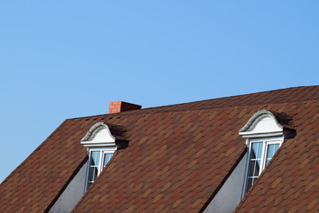 House with a roof made of metal sheets