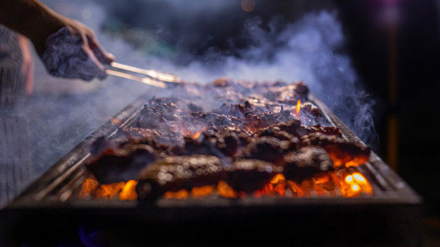  Meat Grilling  On Fire With Smoke 