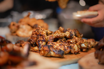  meat grilling  on fire with smoke 