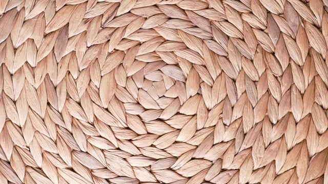 rotating woven straw mat from above