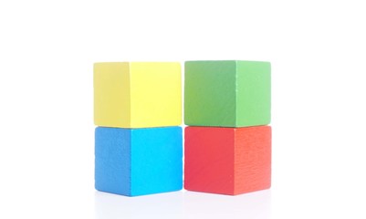 Colorfully wooden toy blocks on white background