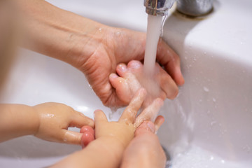 The sink in the bathroom. Washing children's hands.