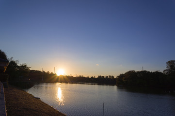 Sunset reflected in the lake, Flower Expo Memorial Tsurumi Ryokuchi Park.