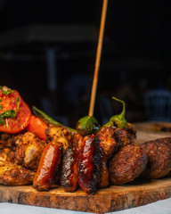  meat grilling  on fire with smoke 