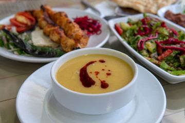 Turkish food dinner with soup and salad