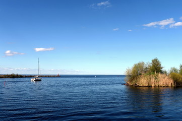 The yacht goes to the White lake from the city of Belozersk. Vologda region