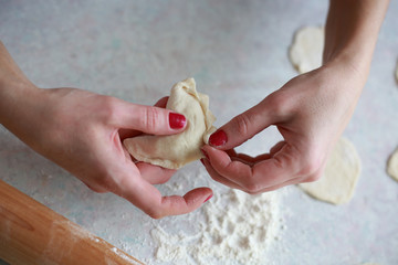 home cooking dumplings to sculpt the hands out of the dough