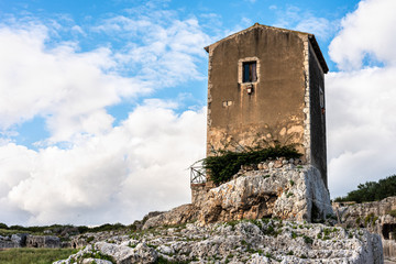  old stone building in the Greek theater of Syracuse