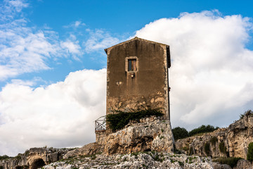  old stone building in the Greek theater of Syracuse