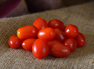 Cheery tomato on sackcloth