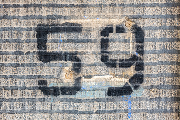 Number 59, fifty nine, street number sign on the wall