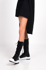 casual sporty style black leather boots, trendy modern woman's footwear fashion and style trends