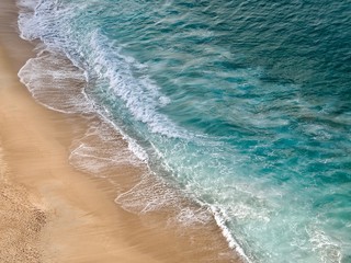 Wonderful aerial view of beach and waves at Nazare in Portugal