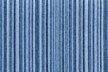 texture of vertical striped fabric colored in trendy color of year 2020 Classic Blue.