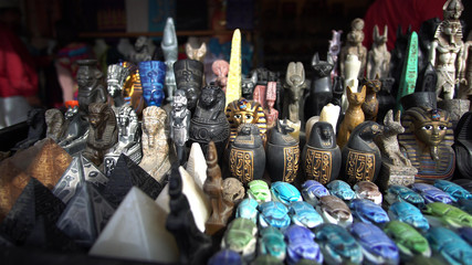 Egyptian souvenir stone craft to pharaoh sphinx pyramid scarab statues selling for tourist in Egypt