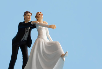 Bride and groom wedding cake topper