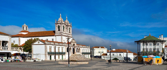City church of Nazare named Nossa Senhora at the Atlantic ocean coast of Portugal