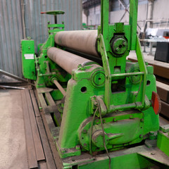 Factory equipment. Bending machine made of shafts. old manual machine tool.