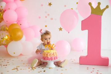 little girl with birthday cake