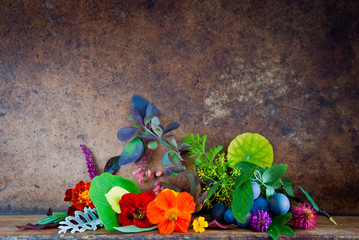 Autumn Leaves, Flowers, Berries on a wooden background